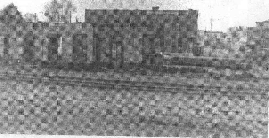 Roofless walls of Hooper’s railroad depot during its 1967 demolition.