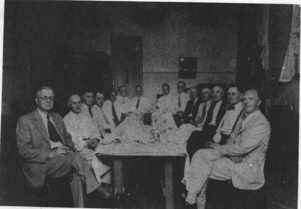 Hooper Commercial Club members seated around a table at the Hooper Inn in 1937