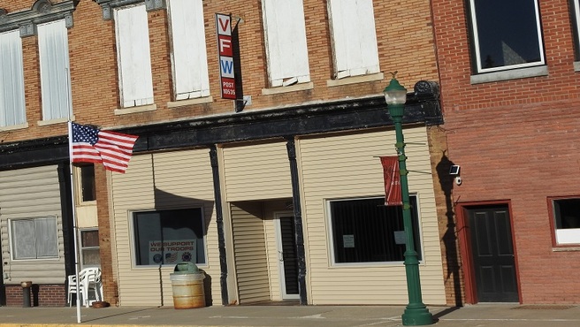 The Hooper VFW storefront with a vertical sign reading VFW Post 10535.
