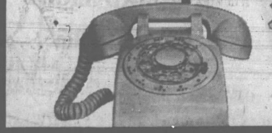 Rotary-dial telephone pictured in Hooper Telephone Company's December 1963 advertisement.