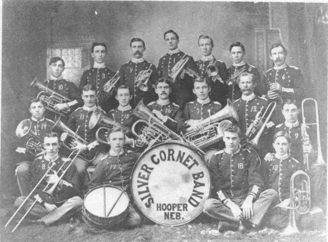 Hooper’s Silver Cornet Band in an undated formal portrait. Its name is visible on the bass drum.