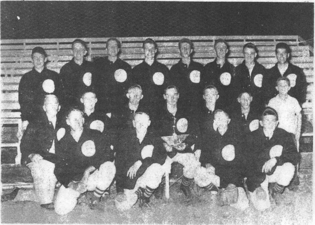 The 1956 Hooper Legion team, Nebraska Class B state champions at Wymore. The book identifies Marion Havekost as coach and Leo Corbin as manager.