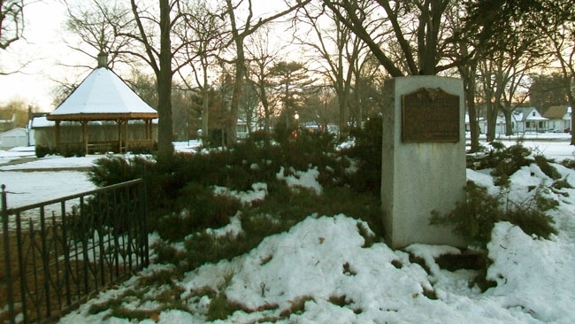 A snow-covered view looking south into Barnard Park in Fremont, with its pavilion and Mormon Pioneer Trail marker, photographed in February 2012.