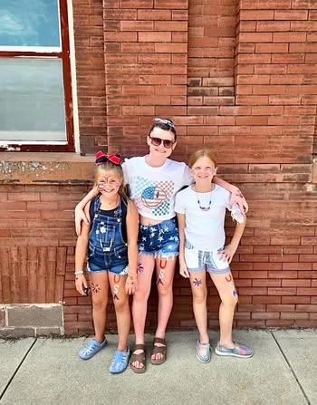 Young celebration attendees downtown — details requested, shared by April Robertson