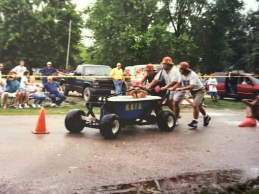 Parade vehicle with riders — details requested, shared by Susan Janssen